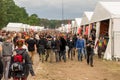 Kostrzyn nad OdrÃâ¦, Poland - July 15, 2016: people walking between the commercial tents at the Przystanek Woodstock Royalty Free Stock Photo